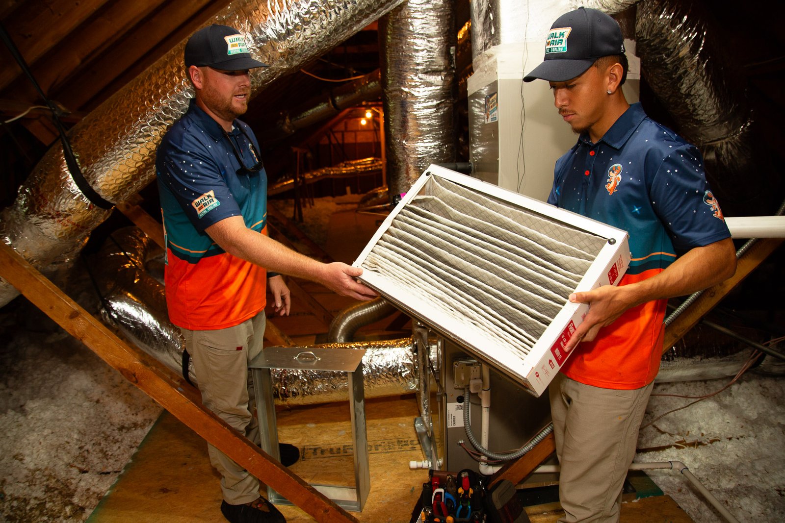 Peachtree City HVAC tech changing out an air filter